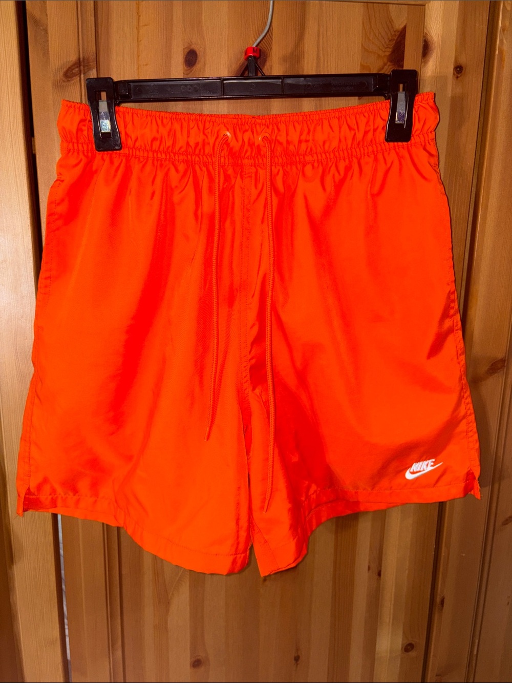 Nike Women's Bright Orange Athletic Shorts with Logo